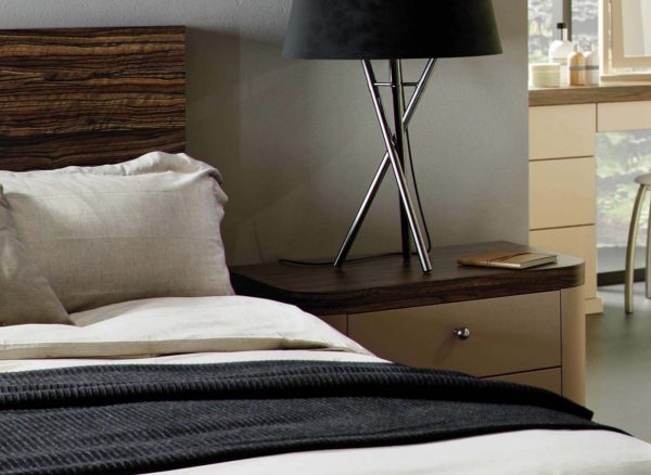 Curved profiles on bedside drawers