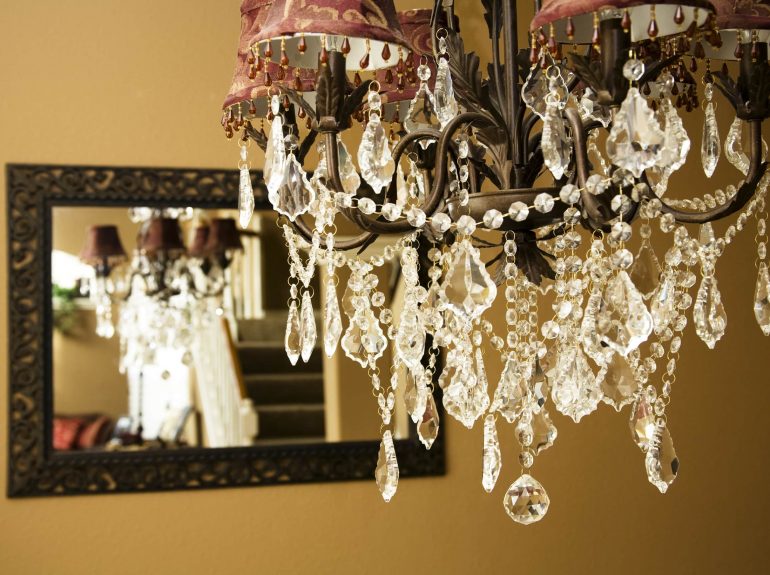 Statement chandelier in hallway 