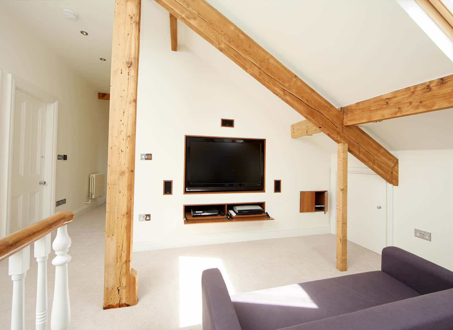 Case study showing entertainment room in loft conversion