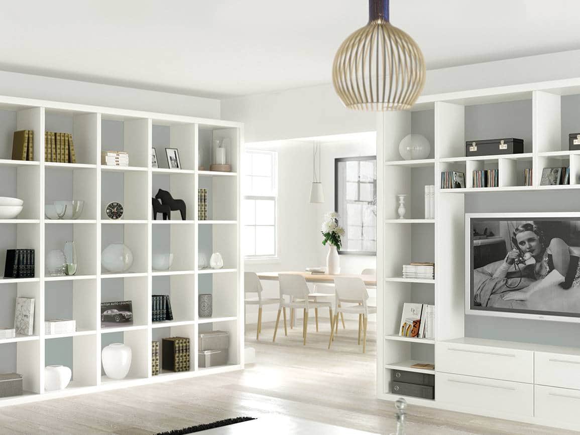 Fitted bookshelves with a pale blue backing