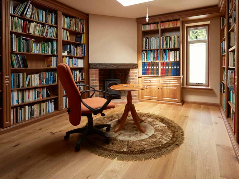 Fitted home library with bespoke bookcases