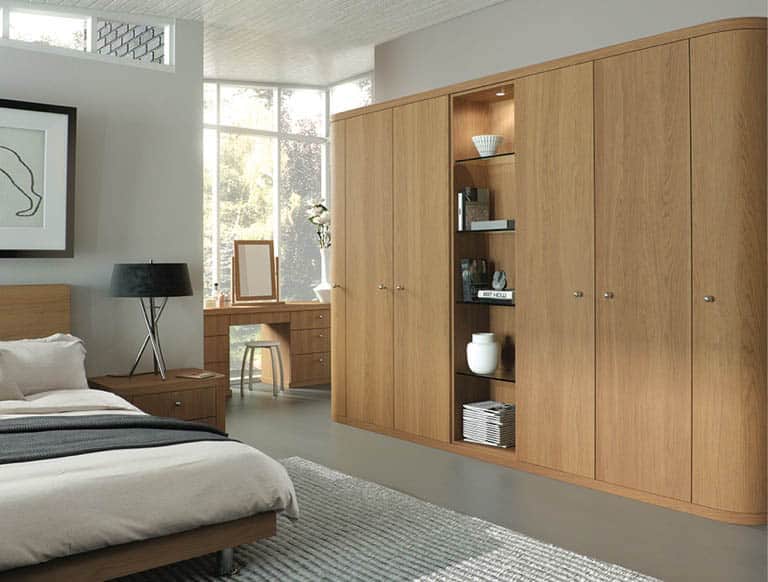 Optima fitted wardrobe finished in natural oak