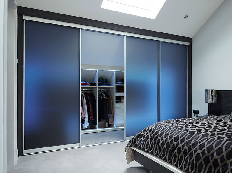 Case study showing sliding wardrobe doors with LED lights