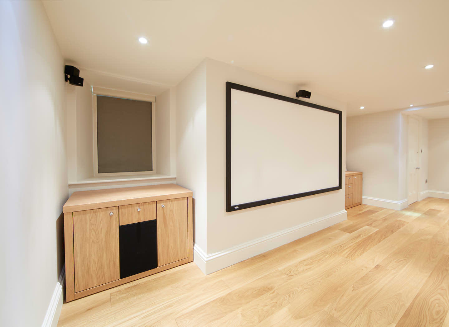 Case study showing speaker cabinet in home cinema basement conversion Case study showing speaker cabinet in home cinema basement conversion