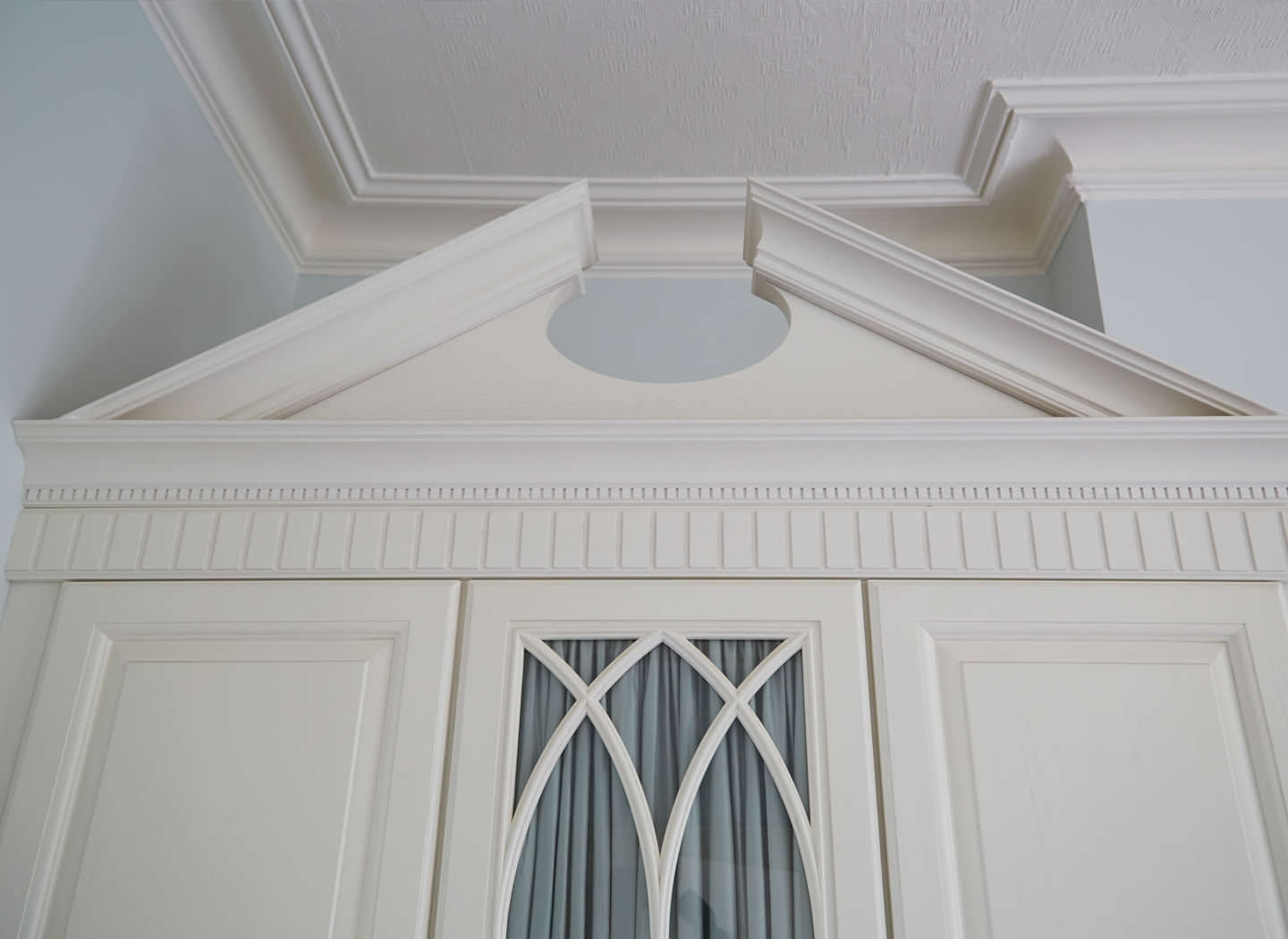 Case study showing traditional wardrobe pediment