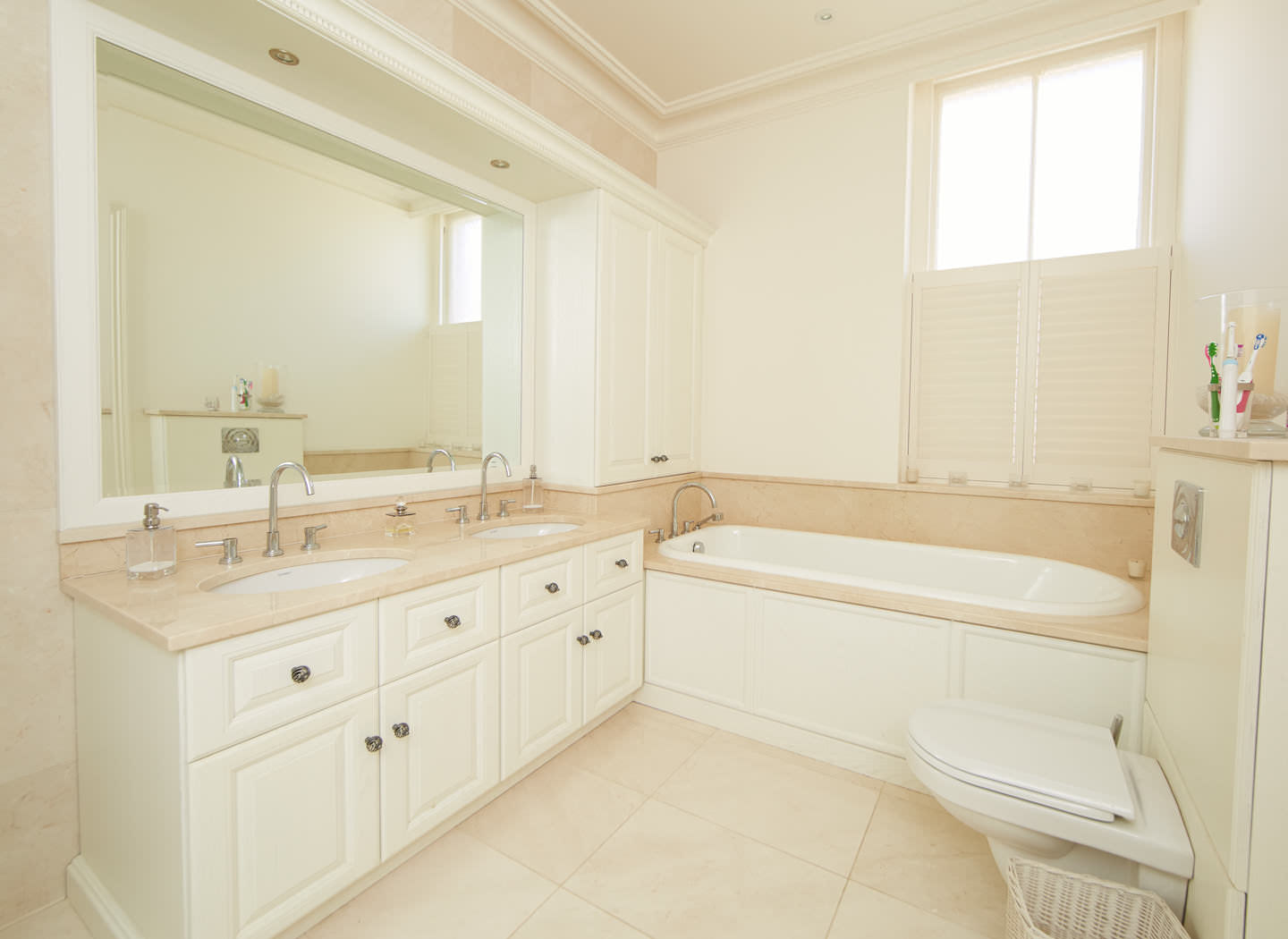 Case study showing fitted cabinets in bedroom en suite