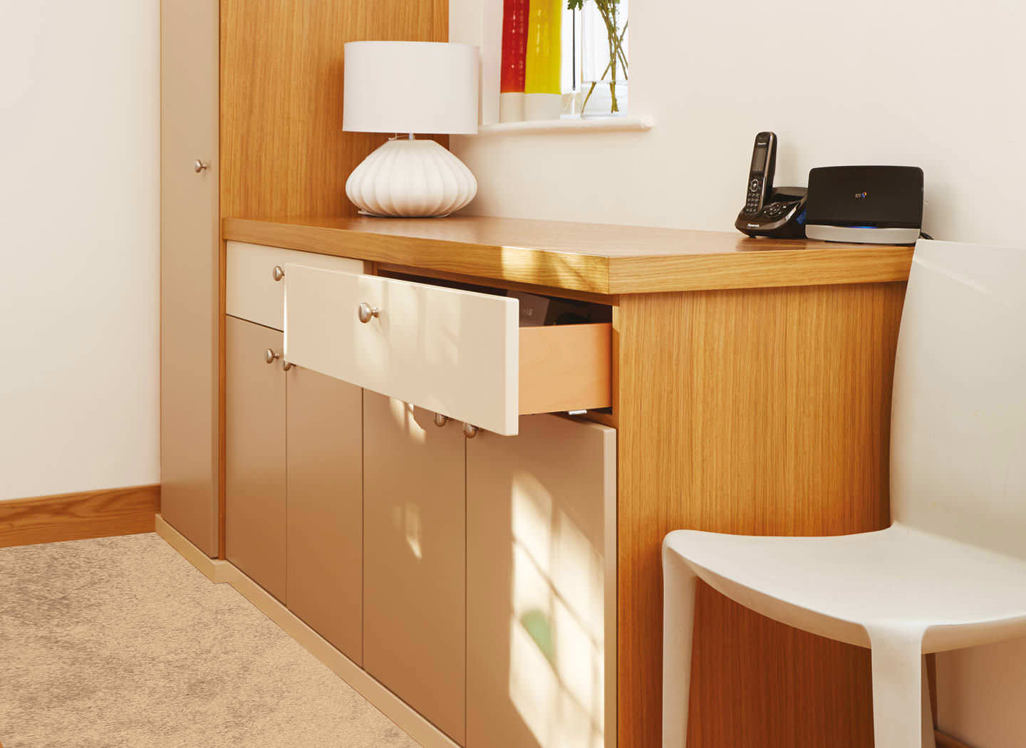Case study showing open drawers and wardrobe in hallway Case study showing open drawers and wardrobe in hallway