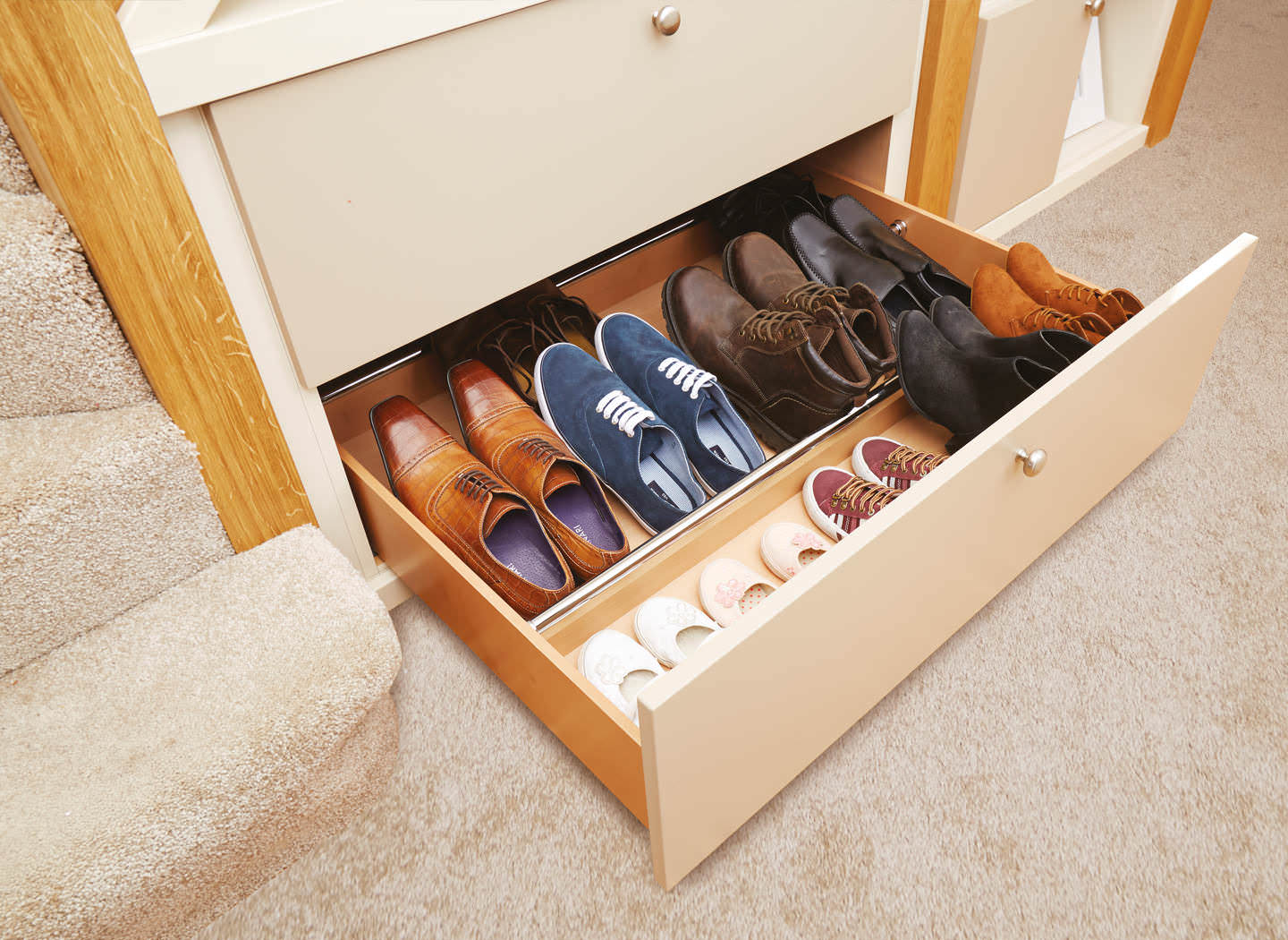 Case study showing pull out shoe drawer in hallway Case study showing pull out shoe drawer in hallway