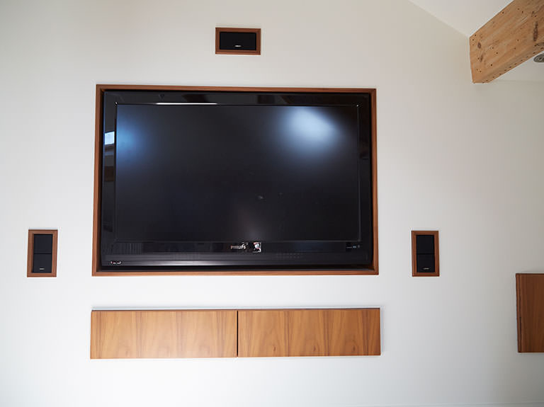 Bespoke wood surrounds for inset speakers