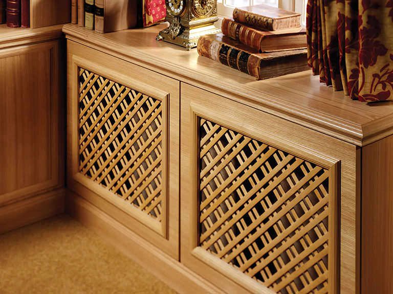 Bespoke radiator covers under window in Shades of Oak home office