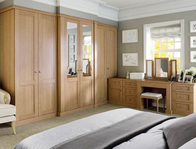 Verona fitted bedroom wardrobe and dresser finished in English oak