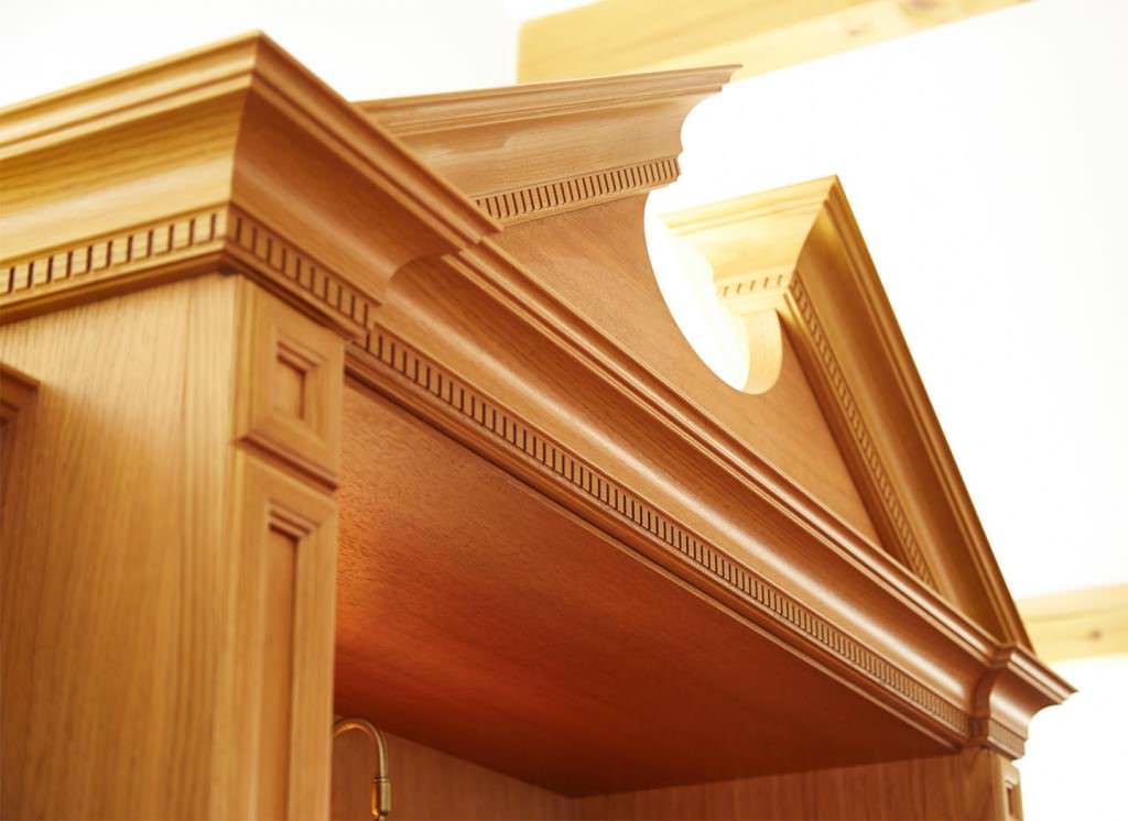 Case study showing traditional wardrobe pediment detail