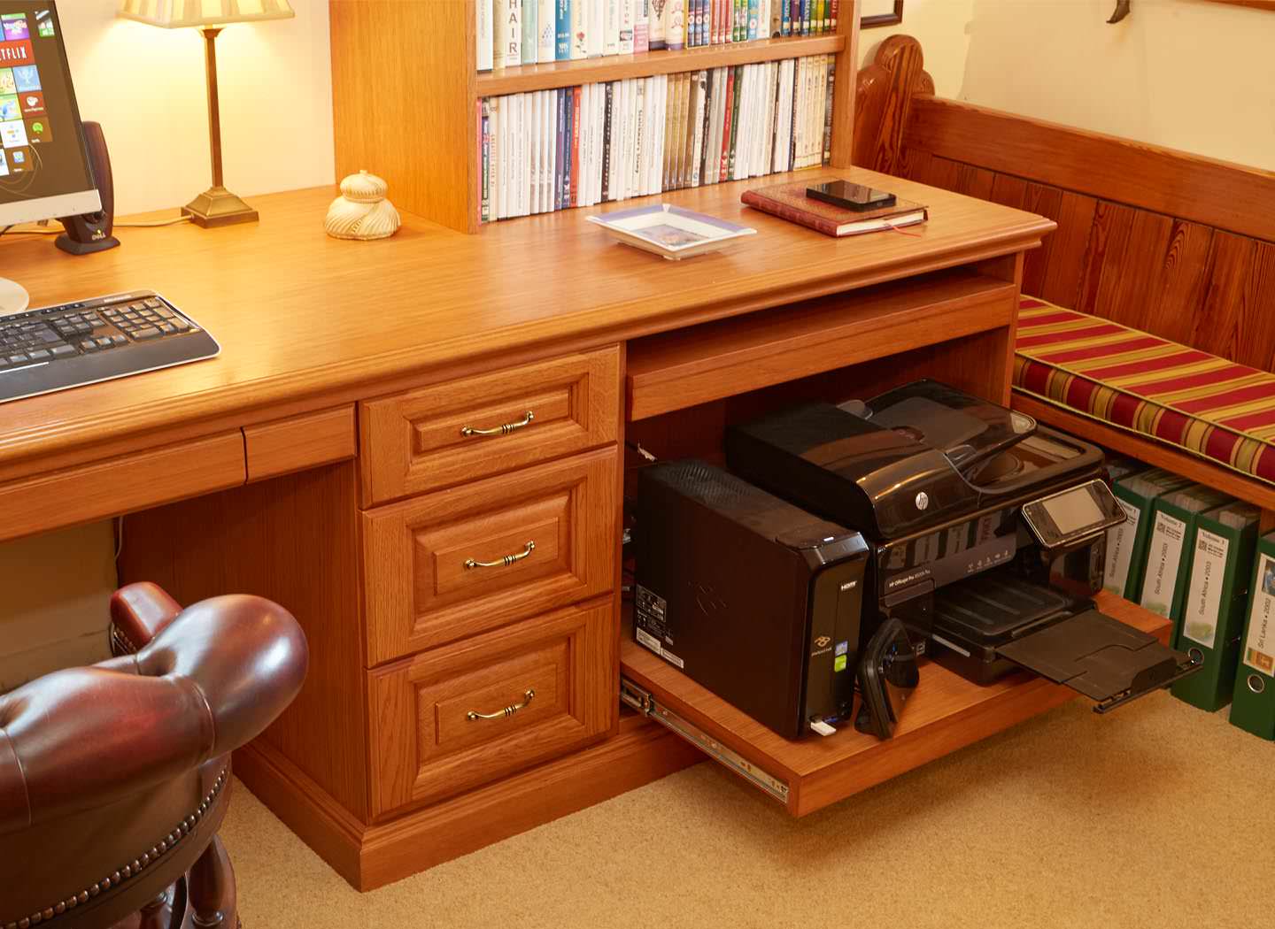 Pull out printer tray in fitted desk