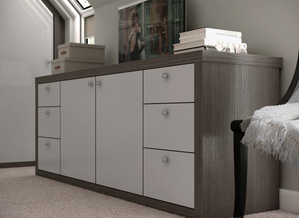 Low level bedroom storage shown with contrasting finishes