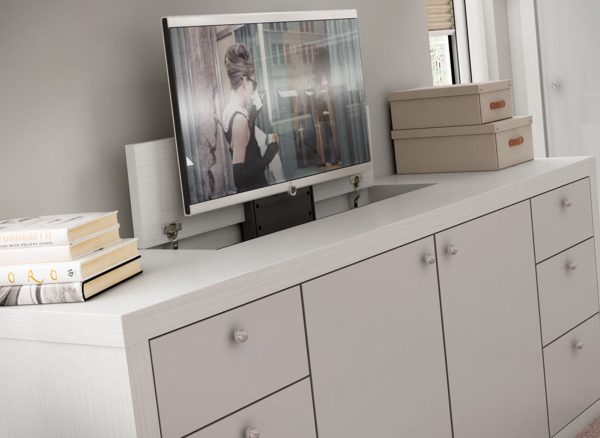 Bedroom storage with integrated pop-up television