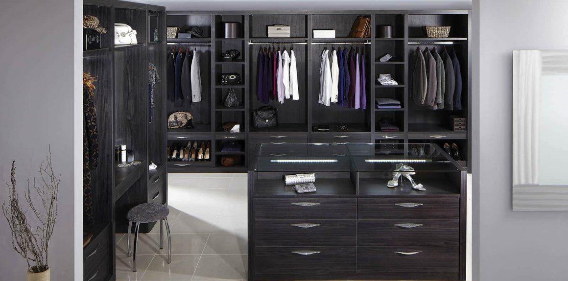 Fitted dressing room in dark wood