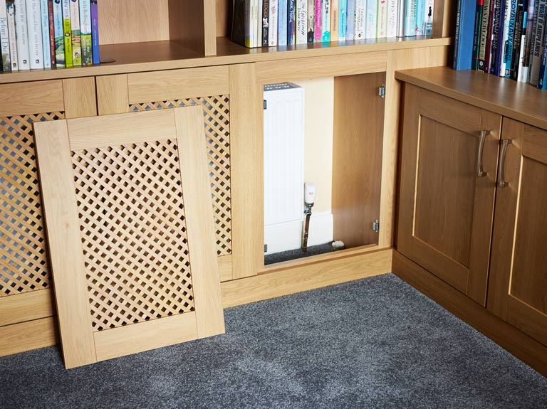 Bespoke radiator covers to match built in bookcases