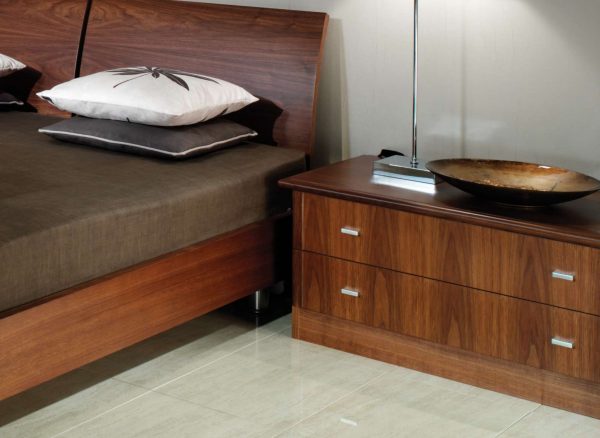 Fitted bedside tables in dark walnut