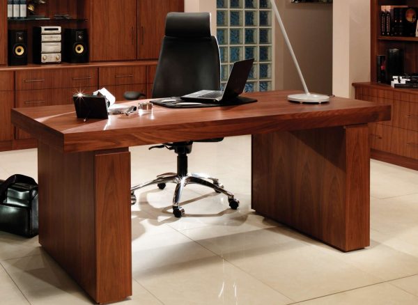 Pull-out pilasters in a wooden home office desk