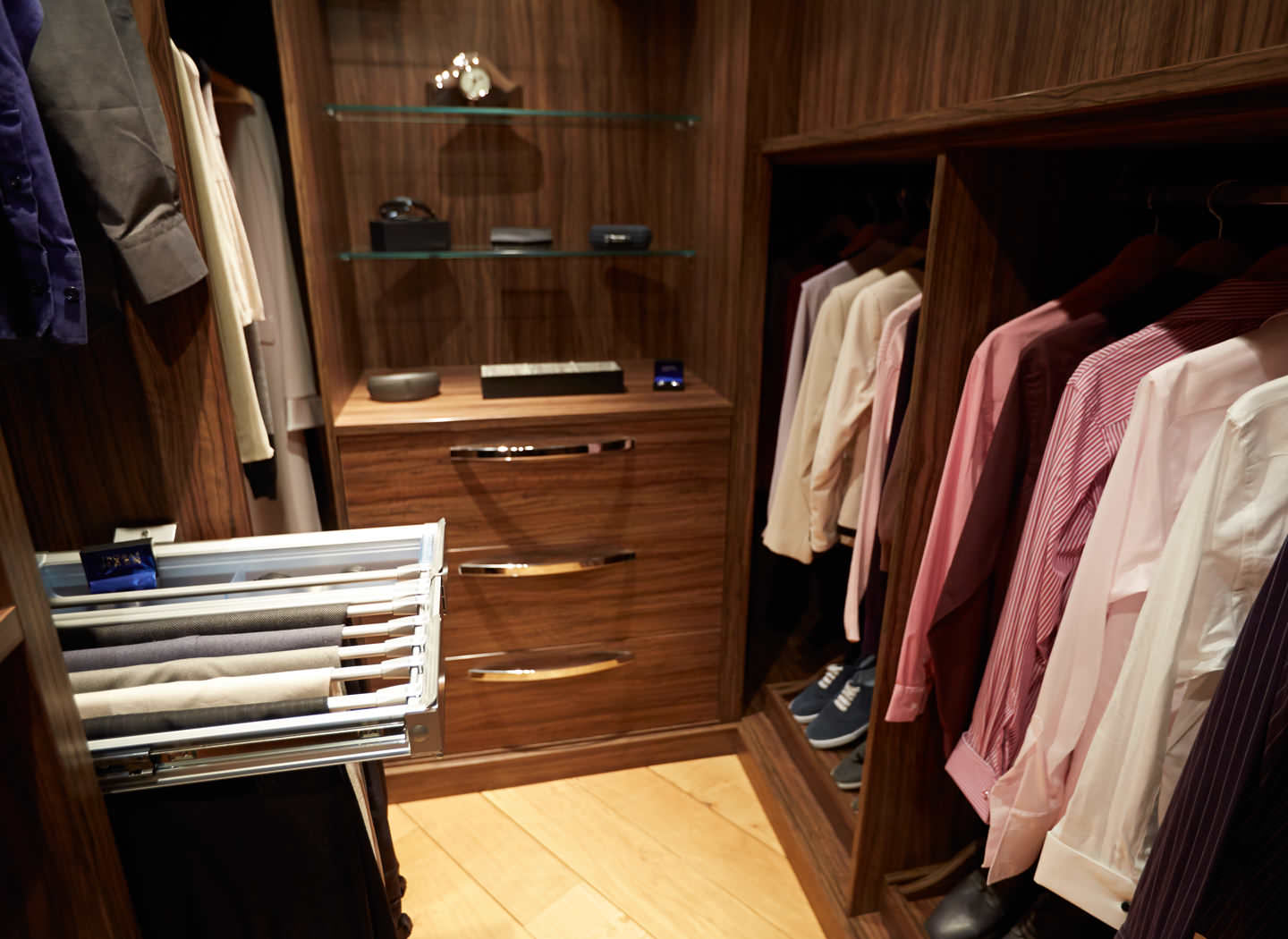 Case study showing full depth storage in walk in wardrobe Case study showing full depth storage in walk in wardrobe