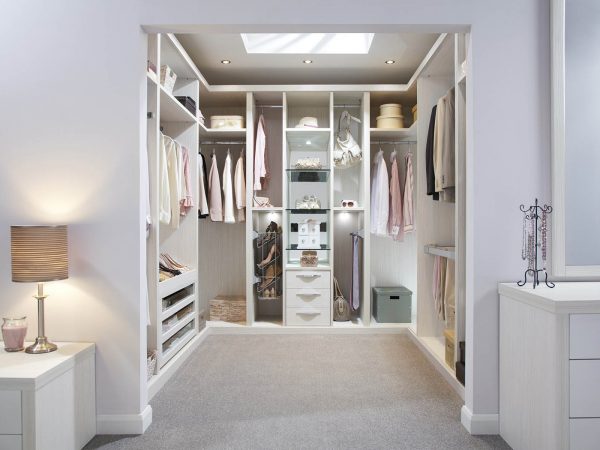 Fitted white walk in wardrobe Fitted white walk in wardrobe